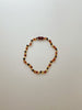 BARNSTEEN-AMBER-KETTING-BABY-KIND-AIANDMI