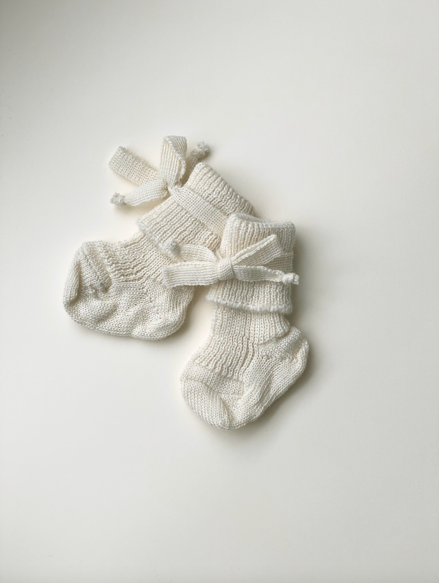 Hirsch Natur - wollen sokken - strikje - 0 t/m 3 maanden - naturel